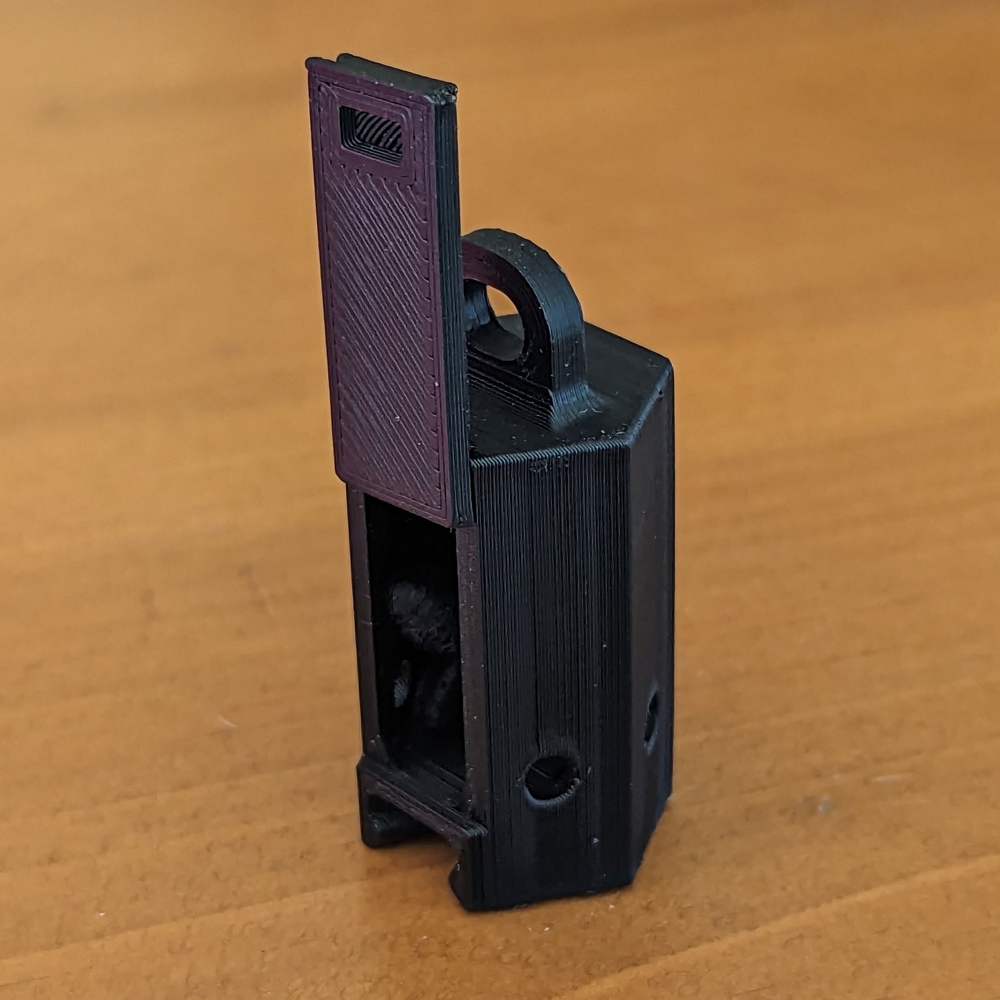 Nosey Box Suspended with lid open and odor inside